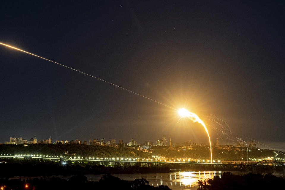 Ukrainian air defense intercepts a Shahed drone mid-air in the third Russia aerial attack on the capital in the last 24 hours in Kyiv, Ukraine, Tuesday, May 30, 2023. (AP Photo/Evgeniy Maloletka)