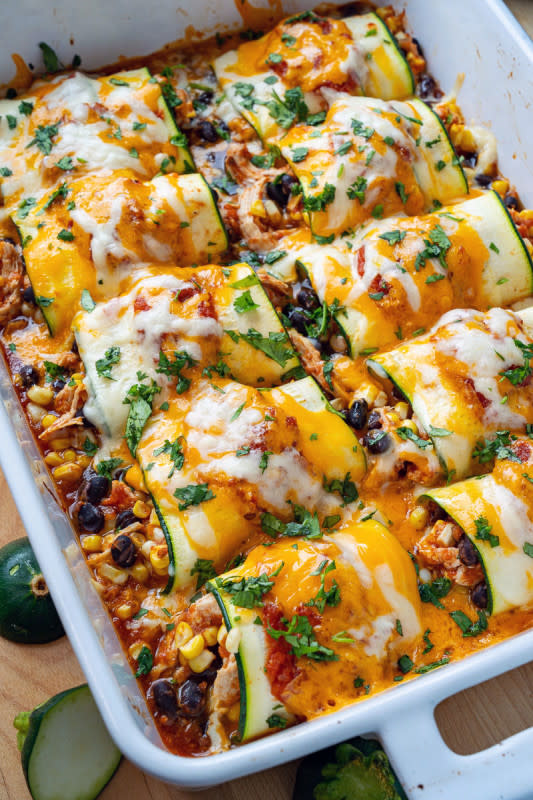 <p>Closet Cooking</p><p>Tasty chicken enchiladas made with zucchini wrappers instead of tortillas!</p><p><strong>Get the recipe: <a href="https://www.closetcooking.com/zucchini-enchilada-roll-ups/" rel="nofollow noopener" target="_blank" data-ylk="slk:Zucchini Enchilada Roll Ups;elm:context_link;itc:0;sec:content-canvas" class="link ">Zucchini Enchilada Roll Ups</a></strong></p>