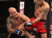 BELO HORIZONTE, BRAZIL - JUNE 23: (L-R) Wagner "Galeto" Campos punches Marcos Vinicius "Vina" during their UFC 147 featherweight bout at Estadio Jornalista Felipe Drummond on June 23, 2012 in Belo Horizonte, Brazil.