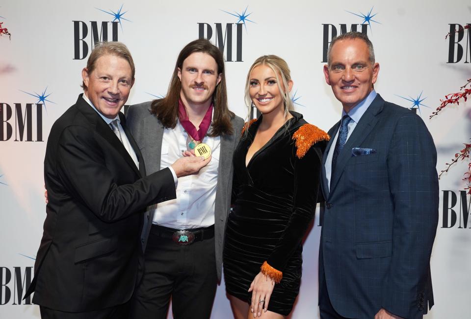 BMI Vice President Creative Clay Bradley, songwriter John Morgan, Hailey Rae Morgan and BMI President and CEO Mike O'Neill attend the 2022 BMI Country Awards in Nashville