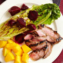 <p>Grilled lettuce? Definitely! Romaine lettuce, seasoned with lemon juice and olive oil, is grilled quickly, topped with balsamic-marinated beets and served with tender flank steak in this crowd-pleasing recipe.</p>