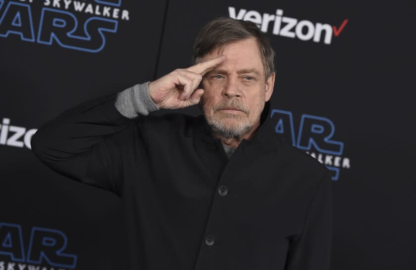 File - In this Dec. 16, 2019, file photo, Mark Hamill arrives at the world premiere of "Star Wars: The Rise of Skywalker" in Los Angeles. The force was strong enough at an Arizona store to reunite Luke Skywalker with his long-lost vinyl record. Hamill is praising workers at Bookmans Entertainment Exchange in Flagstaff for returning the "Star Wars: A New Hope" soundtrack that had been a gift from film composer John Williams. Hamill said in a tweet Saturday, Jan. 11, 2020, that it felt "totally unexpected & positively surreal" to get back the record he had not seen since the early 1990s. He commended the store about 145 miles (233 kilometers) north of Phoenix for being honest and not selling it. (Jordan Strauss/Invision/AP, File)