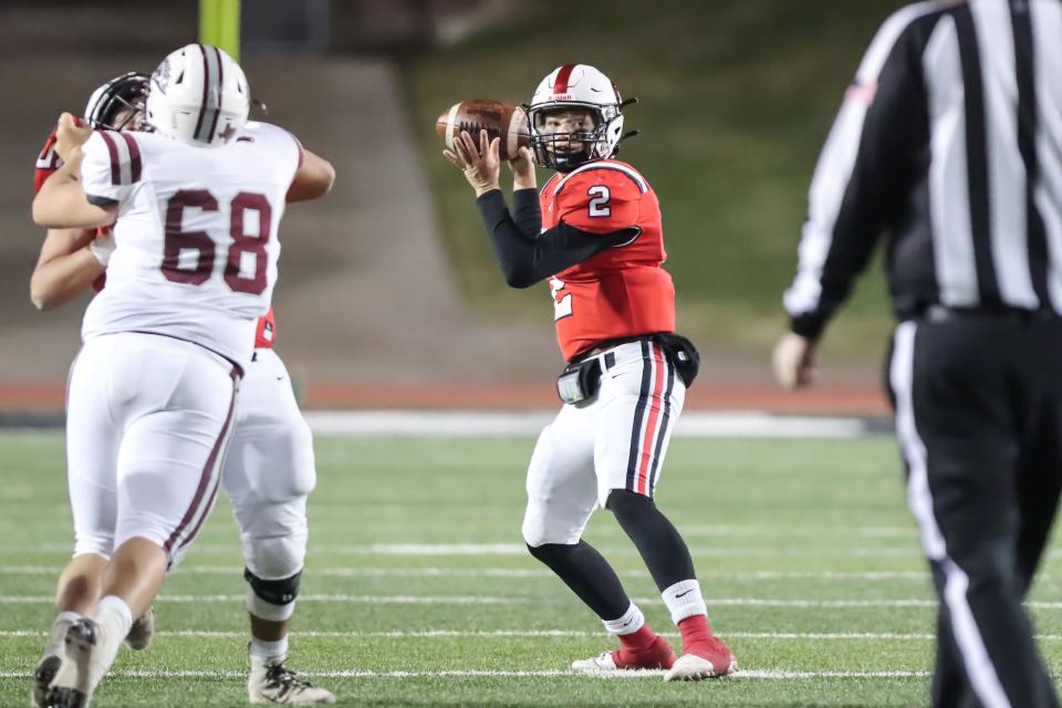 Gruver’s Mason Gibson (2) passes the ball in a 2A Division II Bi-District game against Clarendon,  Thursday, November 10, 2022, at Dick Bivins Stadium in Amarillo. Clarendon won 47-20.