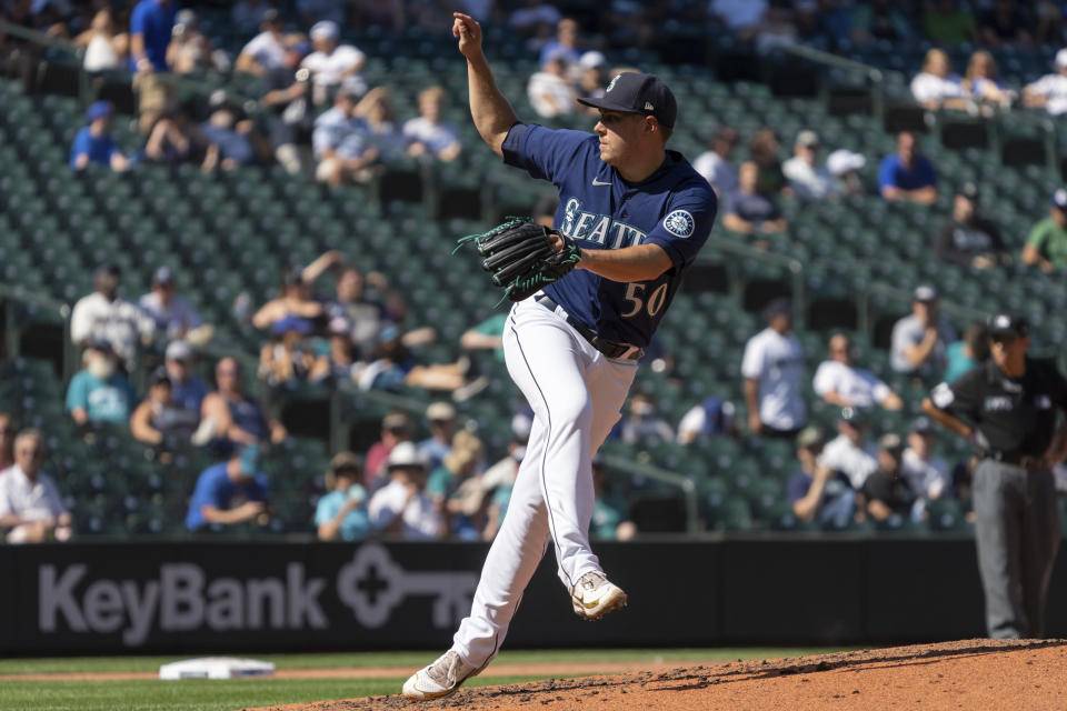 Seattle Mariners reliever Erik Swanson delivers a pitch during the seventh inning of a baseball game against the Cleveland Guardians, Thursday, Aug. 25, 2022, in Seattle. (AP Photo/Stephen Brashear)
