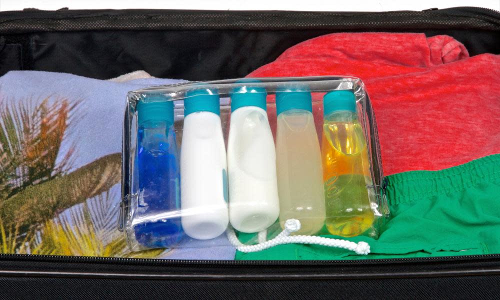 A bag containing 100ml containers of liquids