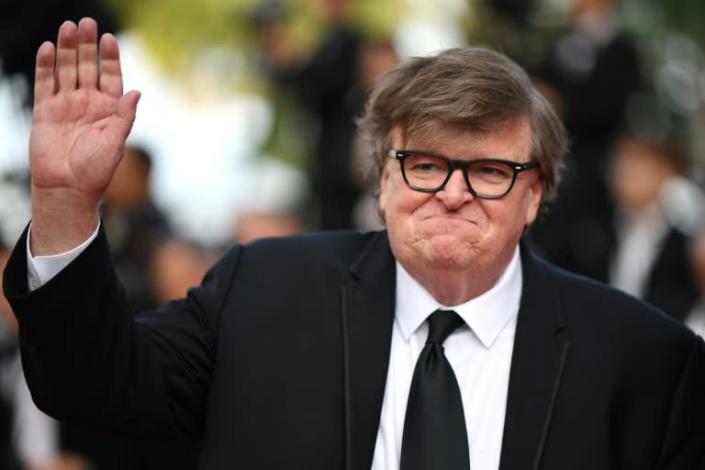 US filmmaker Michael Moore earned plaudits from President Donald Trump for criticizing the performance of former special prosecutor Robert Mueller at congressional hearings about the Russian election interference probe (AFP Photo/LOIC VENANCE)