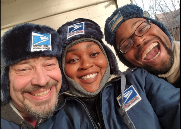 Tia R. (middle) stands with Aundre Cross (right). Cross was shot and killed earlier this month while delivering mail on Milwaukee's north side.