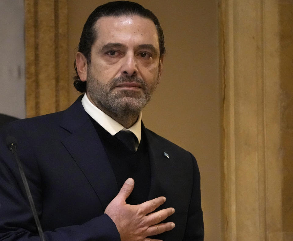Former Lebanese Prime Minister Saad Hariri gestures after he gave a speech at his house in downtown Beirut, Lebanon, Monday, Jan. 24, 2022. Hariri said Monday he is suspending his work in politics and will not run in May's parliamentary elections. (AP Photo/Hussein Malla)