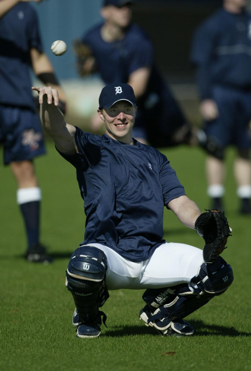 Detroit Tigers catcher Brandon Inge warms in Lakeland, Fla., on Feb. 11, 2003.