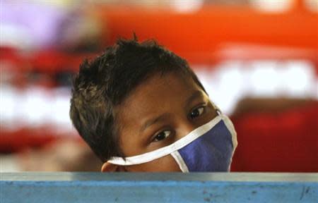 A boy who is a cancer patient rests inside the children's ward at the Cancer Centre Welfare Home and Research Institute in Kolkata March 16, 2012. REUTERS/Rupak De Chowdhuri