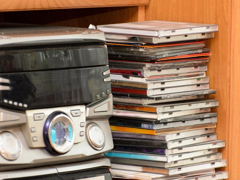 CDs and a CD player, may they rest in place (iStock)