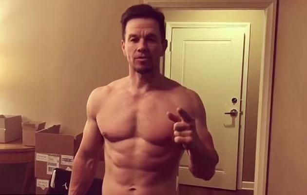 Actor Mark Wahlberg shows off his ripped abs and bulging biceps in social media video. Source: Instagram