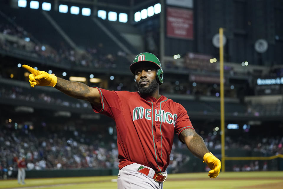 Mexico's Randy Arozarena celebrates after scoring against Canada on Joey Meneses' single during the sixth inning of a World Baseball Classic game in Phoenix, Wednesday, March 15, 2023. (AP Photo/Godofredo A. Vásquez)