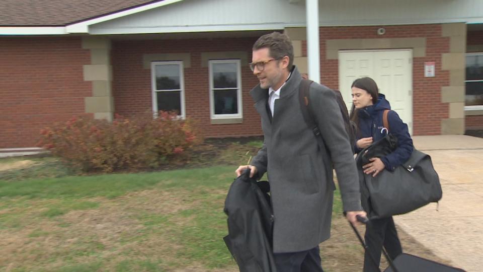 Crown prosecutors James McConnell and Rachel Anstey leave the Burton courthouse on Tuesday.