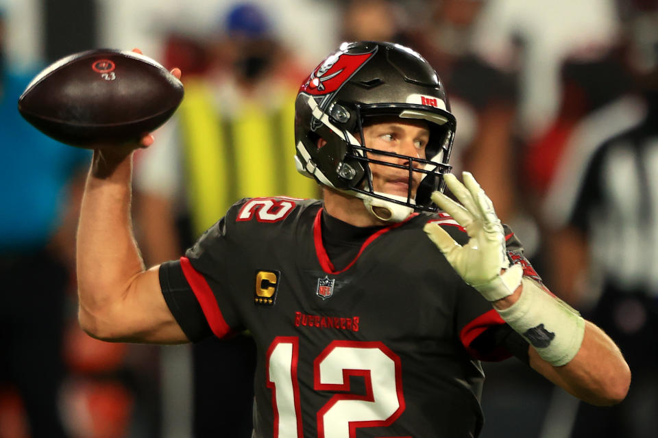 TAMPA, FLORIDA - NOVEMBER 23: Tom Brady #12 of the Tampa Bay Buccaneers looks to throw a pass against the Los Angeles Rams during the second quarter in the game at Raymond James Stadium on November 23, 2020 in Tampa, Florida. (Photo by Mike Ehrmann/Getty Images)