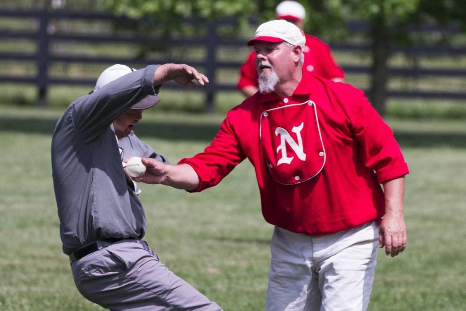 John Santos “One Pocket” Losantiville Black Stockings was tagged out at first by Todd Mattingly “Rabbit” In a vintage baseball game set in the 1860’s The Norwood Highlanders defeated the Losantiville Black Stockings 16-4 at Waveland Historic Site on Sunday May 17, 2015, Lexington, Ky. Photo by Mark Mahan Mark Mahan/2015 file photo