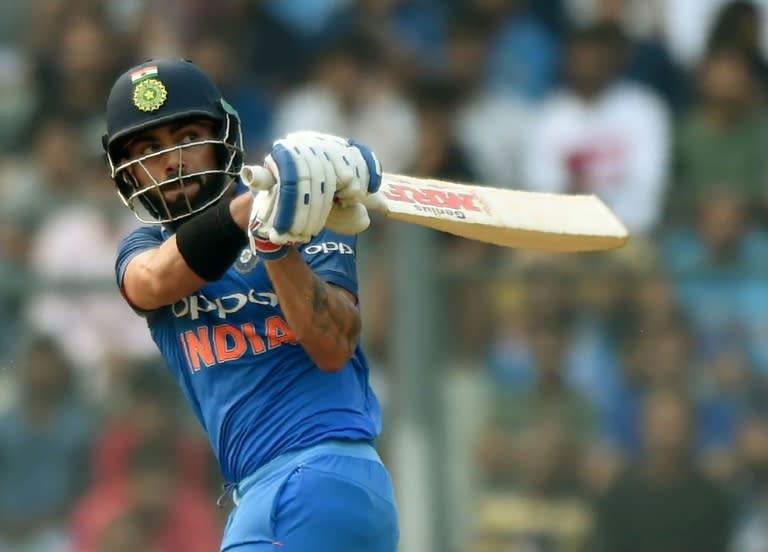 India captain Virat Kohli plays a shot during his side's first one-day international against New Zealand at the Wankhede stadium in Mumbai on October 22, 2017