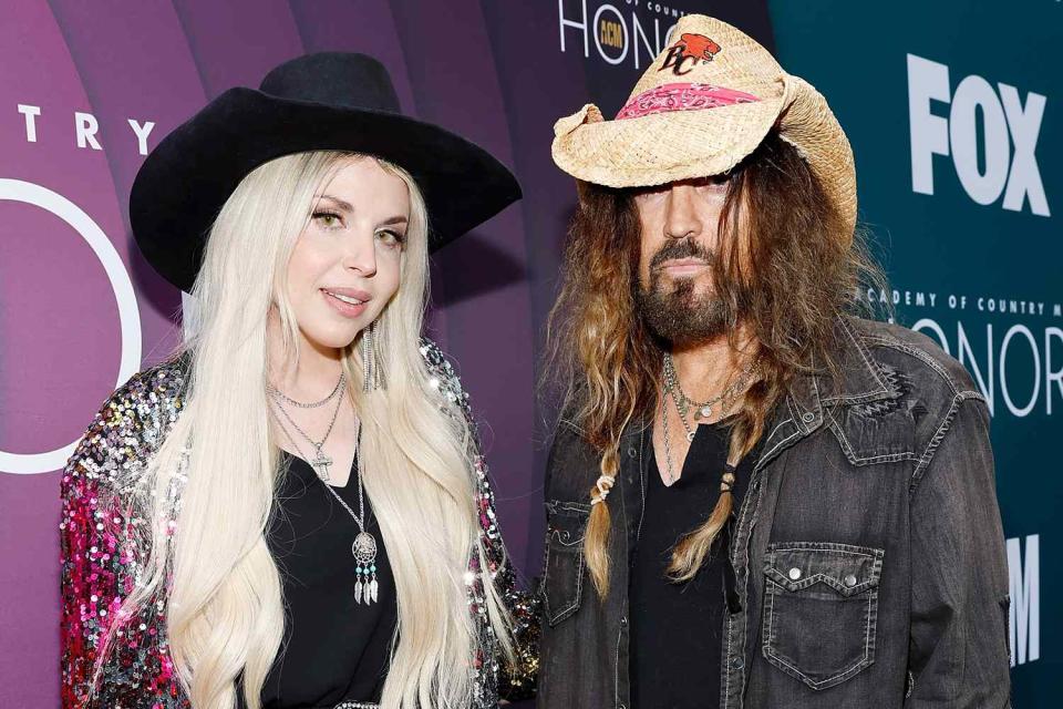 <p>Jason Kempin/Getty</p> FIREROSE and Billy Ray Cyrus