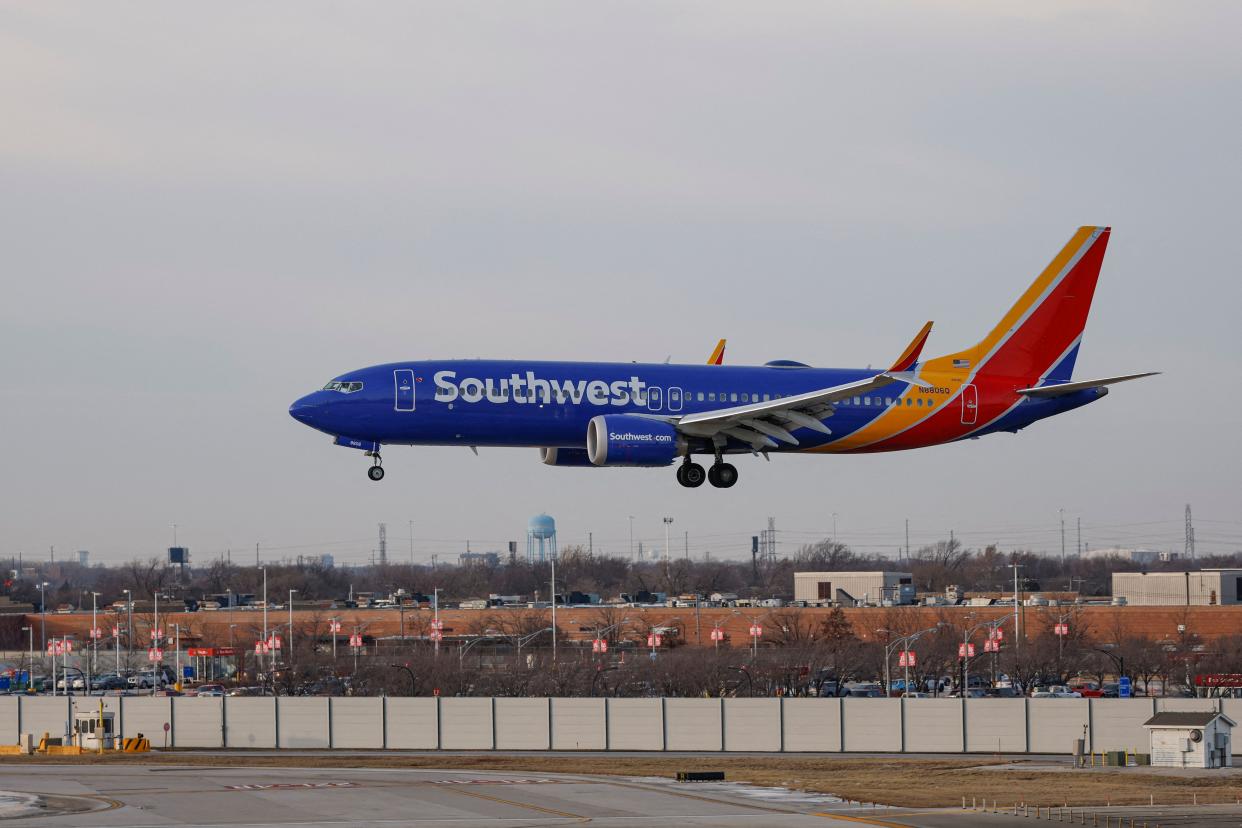 A Southwest Airlines passenger jet lands at Chicago Midway International Airport.