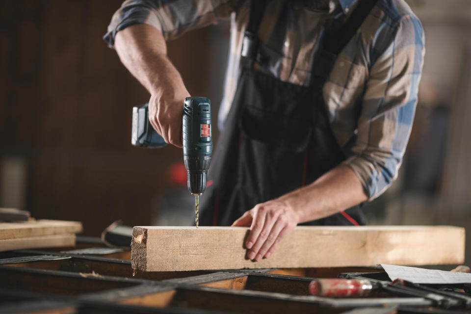 A man using power tools