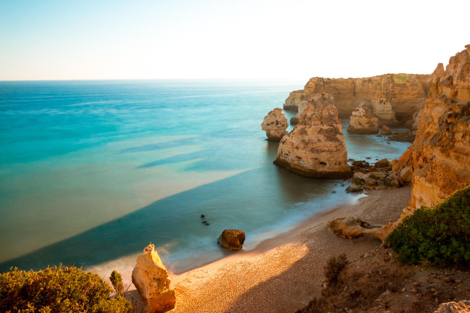 While southern Portugal is more commonly frequented by British tourists, the Algarve boasts great beauty too – including the breathtaking beaches in the protected Ria Formosa National Park. <a href="https://www.i-escape.com/conversas-de-alpendre" rel="nofollow noopener" target="_blank" data-ylk="slk:Conversas del Alpendre;elm:context_link;itc:0;sec:content-canvas" class="link "><strong>Conversas del Alpendre</strong></a> is a small hotel just 2km from Fábrica beach for £85, while there's also the <a href="https://www.i-escape.com/tavira-boutique-apartments" rel="nofollow noopener" target="_blank" data-ylk="slk:Tavira Boutique Apartments;elm:context_link;itc:0;sec:content-canvas" class="link "><strong>Tavira Boutique Apartments</strong></a> located in a converted convent in Tavira’s old town is close to Ria Formosa’s best beaches (£146). [<em>Photo: Getty]</em>