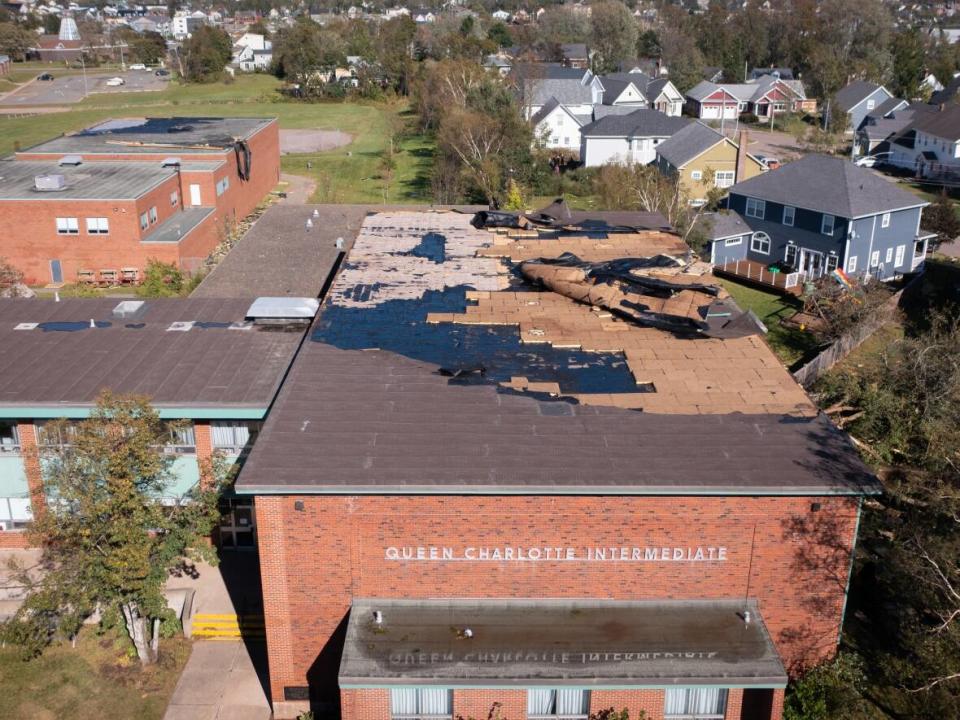 A drone picture showing damage to the Queen Charlotte Intermediate building in Charlottetown. (Shane Hennessey/CBC - image credit)