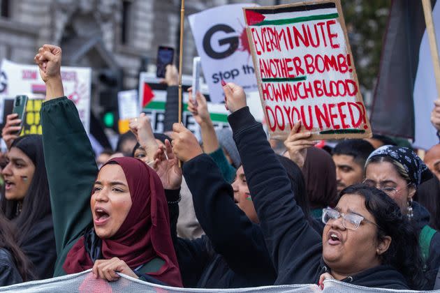 Pro-Palestinian protesters march through central London to call for an immediate ceasefire in Gaza on 28th October 2023 in London, United Kingdom. 