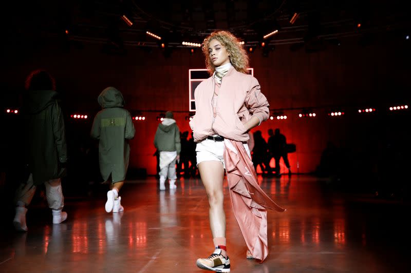 Models present creations during the Tommy Hilfiger 'TOMMYNOW Spring 2020' show during London Fashion Week in London