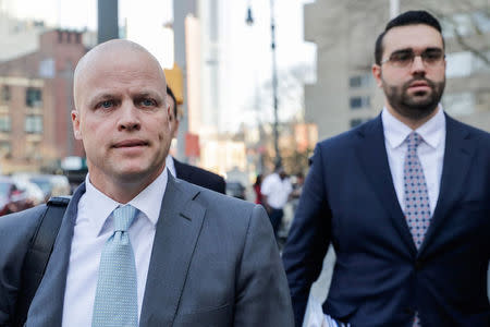 Michael Cohen's attorneys Todd Harrison (L) and Joseph Evans (R) are pictured outside the Manhattan Federal Court in New York City, New York, U.S., April 13, 2018. REUTERS/Jeenah Moon