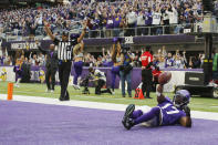 Minnesota Vikings wide receiver K.J. Osborn celebrates after catching a 21-yard touchdown pass during the second half of an NFL football game against the Chicago Bears, Sunday, Jan. 9, 2022, in Minneapolis. (AP Photo/Bruce Kluckhohn)