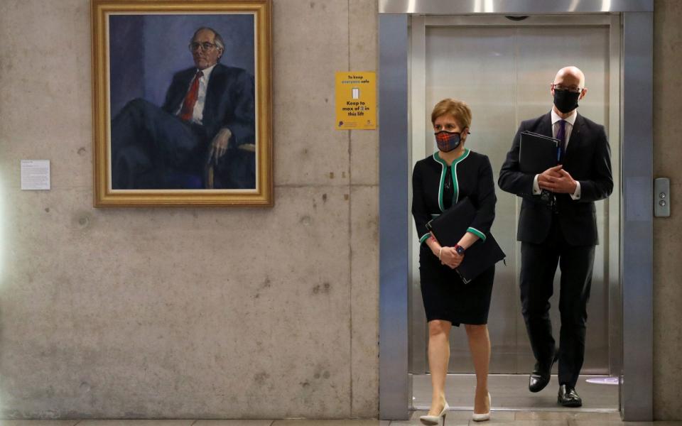 Scottish First Minister Nicola Sturgeon and Deputy First Minister and Cabinet Secretary for Education John Swinney  - Russell Cheyne/PA