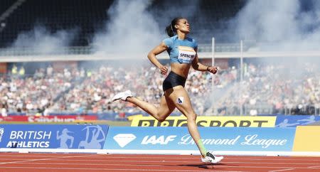 Athletics - IAAF Diamond League 2015 - Sainsbury's Birmingham Grand Prix - Birmingham Alexander Stadium - 7/6/15 Women's 400m Hurdles - Jamaica's Kaliese Spencer winning the race Action Images via Reuters / Andrew Boyers Livepic