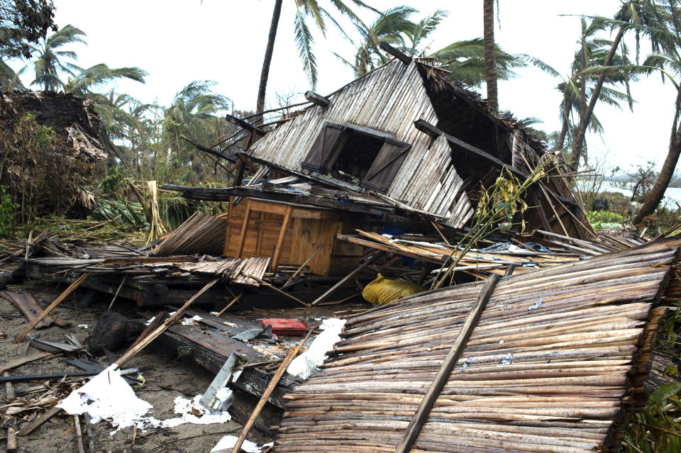 FILE - A house lays in ruins after Cyclone Batsirai in Mananjary, Madagascar, Feb. 10, 2022. Tropical Cyclone Freddy, which has already caused 21 deaths and displaced thousands of others in Madagascar and Mozambique, is set to make landfall in Mozambique again, Friday, March 10, 2023. Meteorologists told The Associated Press the uneven and devastating water distribution across Africa’s eastern states is caused by natural weather systems and exacerbated by human-made climate change with cyclones sucking up water that would otherwise be destined for nations further north. (AP Photo/Viviene Rakotoarivony, File)