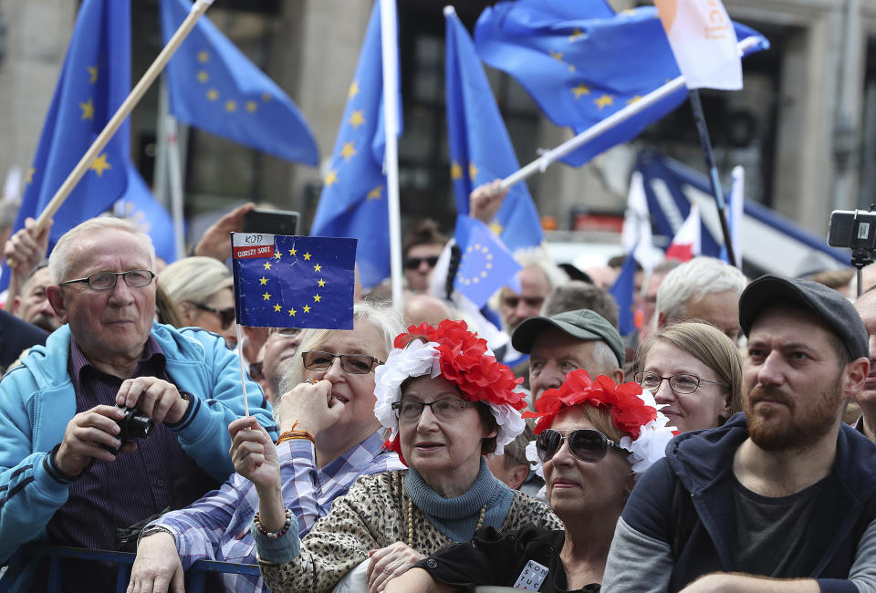 Thousands of Poles with pro-European banners march to celebrate Poland's 15 years in the EU and stressing the nation's attachment to the 28-member bloc ahead of May 26 key elections to the European Parliament, in Warsaw, Poland, Saturday, May 18, 2019. (AP Photo/Czarek Sokolowski)