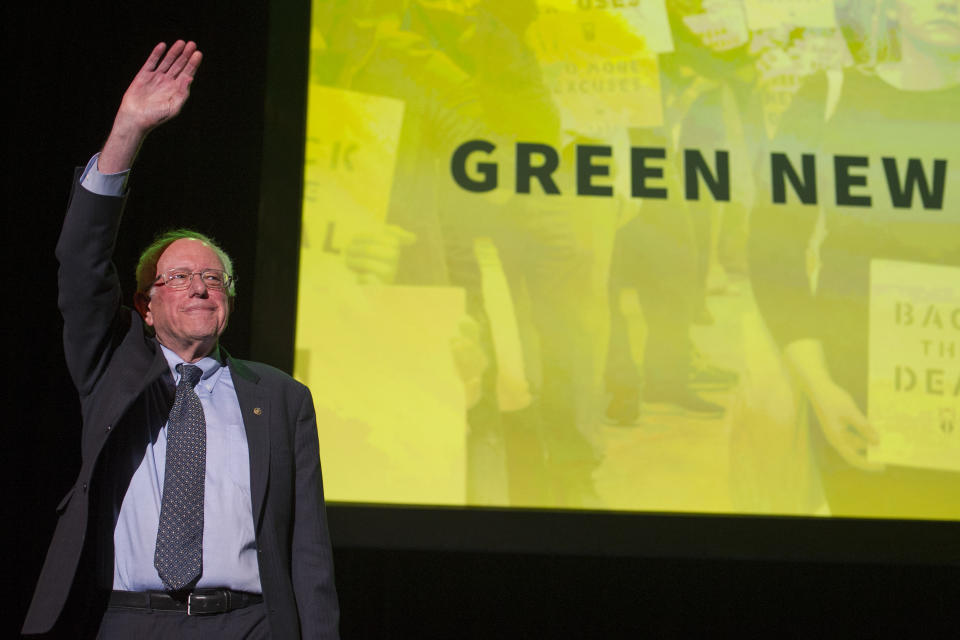 Democratic presidential candidate Sen. Bernie Sanders, I-Vt., walks onstage to address The Road to the Green New Deal Tour final event at Howard University in Washington, Monday, May 13, 2019. (AP Photo/Cliff Owen)