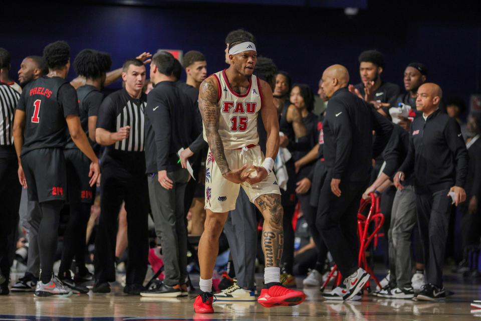 Feb 22, 2024; Boca Raton, Florida, USA; Florida Atlantic Owls guard Alijah Martin (15) reacts after a dunk against the Southern Methodist Mustangs during the first half at Eleanor R. Baldwin Arena. Mandatory Credit: Sam Navarro-USA TODAY Sports