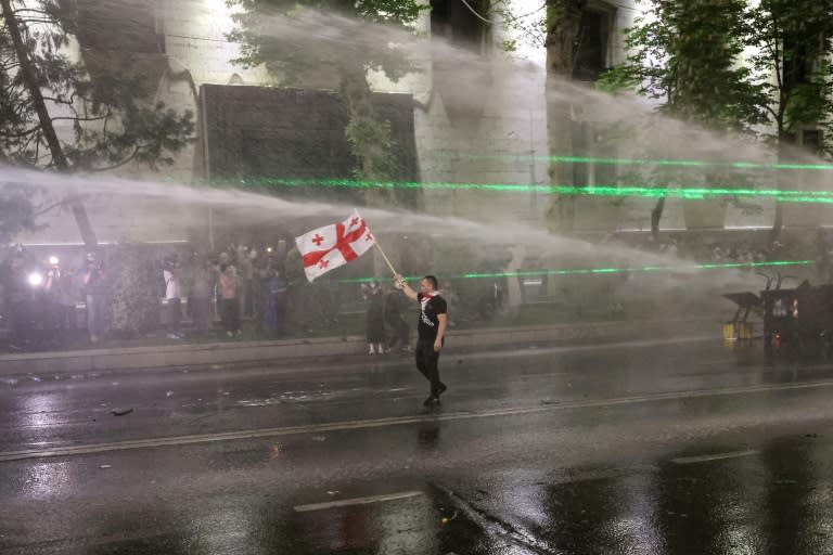 Masked riot police violently rushed the peaceful rally, using tear gas, rubber bullets and water cannon (Giorgi ARJEVANIDZE)
