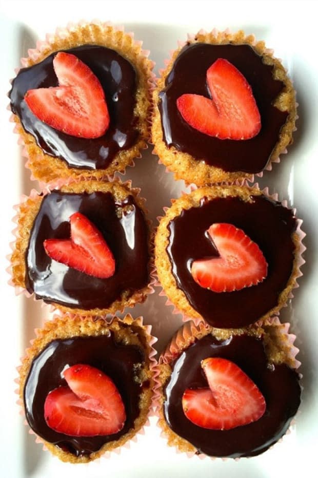 <p><a href="https://reluctantentertainer.com/strawberry-cupcakes-with-ganache/" rel="nofollow noopener" target="_blank" data-ylk="slk:Reluctant Entertainer;elm:context_link;itc:0;sec:content-canvas" class="link ">Reluctant Entertainer</a></p>