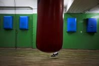 <p>A young Israeli boxer jumps rope ahead of the Israel’s National Youth Boxing Championship at a boxing club in the southern Israeli town of Sderot on Feb. 28, 2012. (Photo: Oded Balilty/AP) </p>