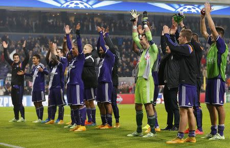 Anderlecht's goalkeeper Silvio Proto (center R) and team celebrate after their Champions League soccer match against Galatasaray at Constant Vanden Stock stadium in Brussels November 26, 2014. REUTERS/Yves Herman