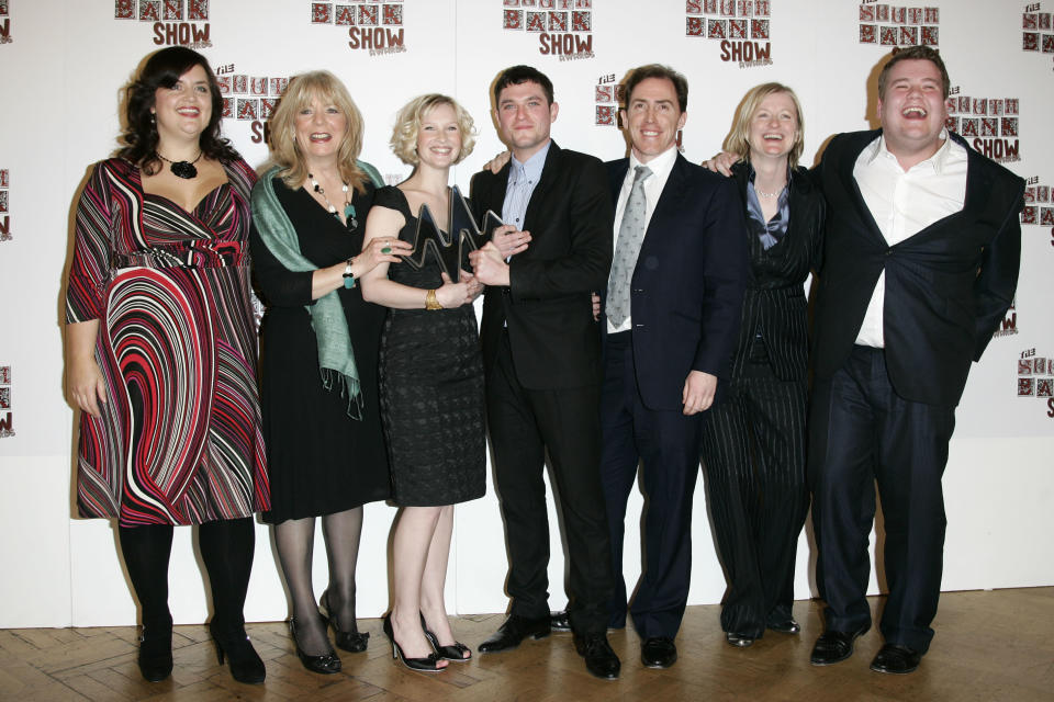 British actor and writer James Corden, right, and actress and writer Ruth Jones, left, pose with their Comedy Award for their tv show 'Gavin and Stacey' with the cast, Alison Steadman, second left, Joanna Page, third left, Mathew Horne, centre, Rob Brydon, third right, and Melanie Walters during the South Bank Show Awards in London, Tuesday, Jan. 29, 2008. (AP Photo/Sang Tan)