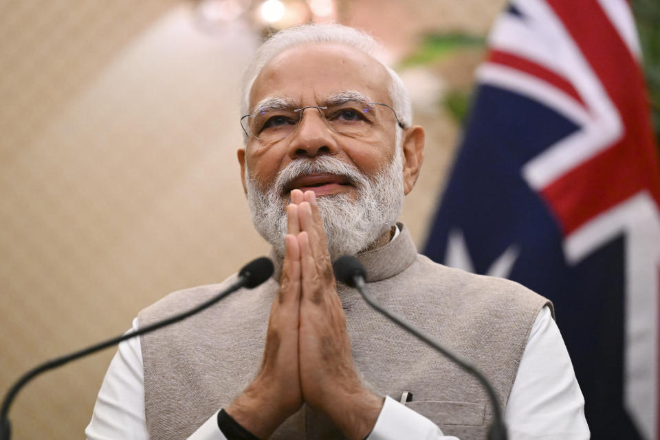 India's Prime Minister Narendra Modi gestures during a news conference following a bilateral meeting with Australian Prime Minister Anthony Albanese at Admiralty House in Sydney, Australia, Wednesday, May 24, 2023. Modi is the only leader of the so-called Quad nations to continue with his scheduled visit to Australia after U.S. President Joe Biden pulled out of a planned meeting of the group in Sydney to return to Washington to focus on debt limit talks. (Dean Lewins/Pool Photo via AP)