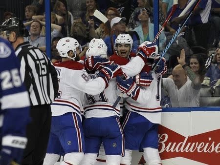 May 6, 2015; Tampa, FL, USA; Montreal Canadiens right wing Brendan Gallagher (11) is congratulated after he scored a goal against the Tampa Bay Lightning during the third period of game three of the second round of the 2015 Stanley Cup Playoffs at Amalie Arena. Tampa Bay Lightning defeated the Montreal Canadiens 2-1. Mandatory Credit: Kim Klement-USA TODAY Sports