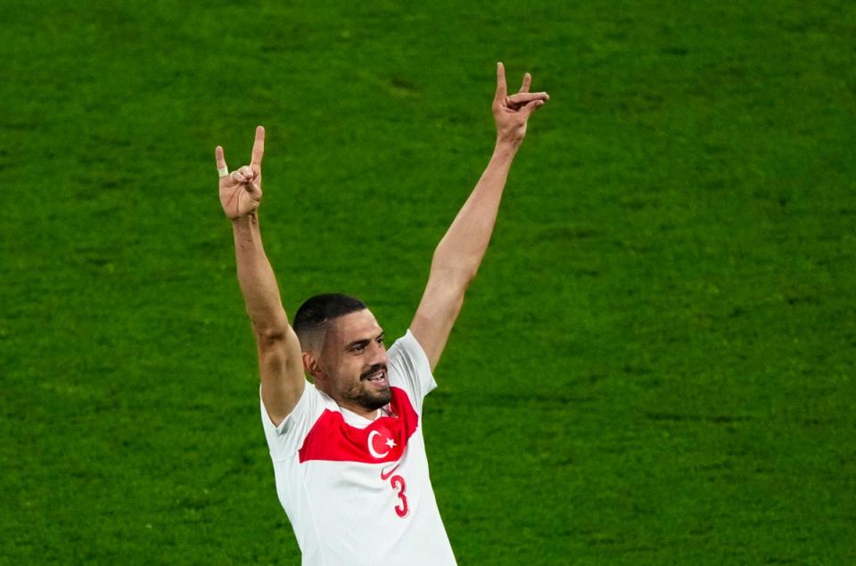 Merih Demiral celebrates Turkey's second goal against Austria during the Euro 2024 tournament in Leipzig, Germany, July 2 (AP)