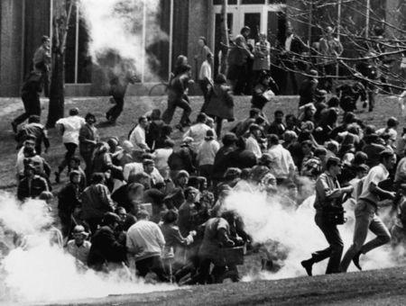 Kent State University students scatter as tear gas from the national guard disperses the crowd during demonstrations protesting the war in Vietnam, at Kent State University in Kent, Ohio, May 4, 1970. May 4 Collection/Kent State University Libraries/Special Collections and Archives/Handout via REUTERS