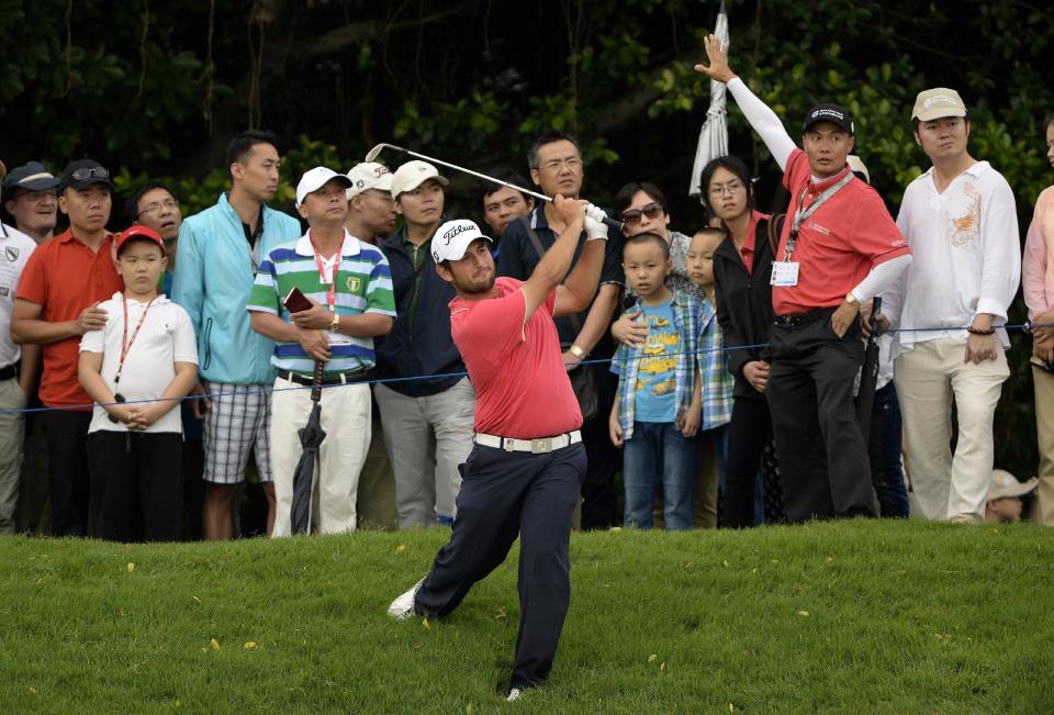 In this photo released by OneAsia, Alexander Levy of France watches his shot during the third round of the Volvo China Open at Genzon Golf Club in Shenzhen, southern China, Saturday, April 26, 2014. (AP Photo/OneAsia, Paul Lakatos) NO LICENSING