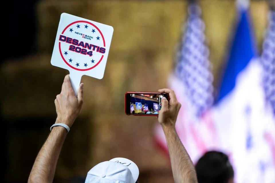 Supporters of Republican presidential candidate Florida Gov. Ron DeSantis hold fans during the annual Roast and Ride fundraiser for U.S. Sen. Joni Ernst, Saturday, June 3, 2023, at the Iowa State Fairgrounds in Des Moines, Iowa. Joseph Cress/Iowa City Press-Citizen/Joseph Cress/Iowa City Press-Citizen / USA TODAY NETWORK