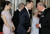 LONDON, UNITED KINGDOM - OCTOBER 23: Prince Charles, Prince of Wales (R) meets James Bond actor Daniel Craig (C) and his wife Rachel Weisz as they arrive for the Royal World Premiere of the James Bond film "Skyfall" at the Royal Albert Hall on October 23, 2012 in London, England. (Photo by Kirsty Wigglesworth - WPA Pool/Getty Images)