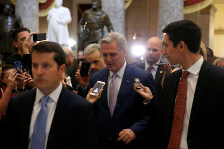 U.S. House Majority Leader Kevin McCarthy (R-CA) (C) is trailed by reporters after the House voted on a procedural measure to move ahead with health care legislation to repeal Obamacare at the U.S. Capitol in Washington, U.S., March 24, 2017. REUTERS/Jonathan Ernst