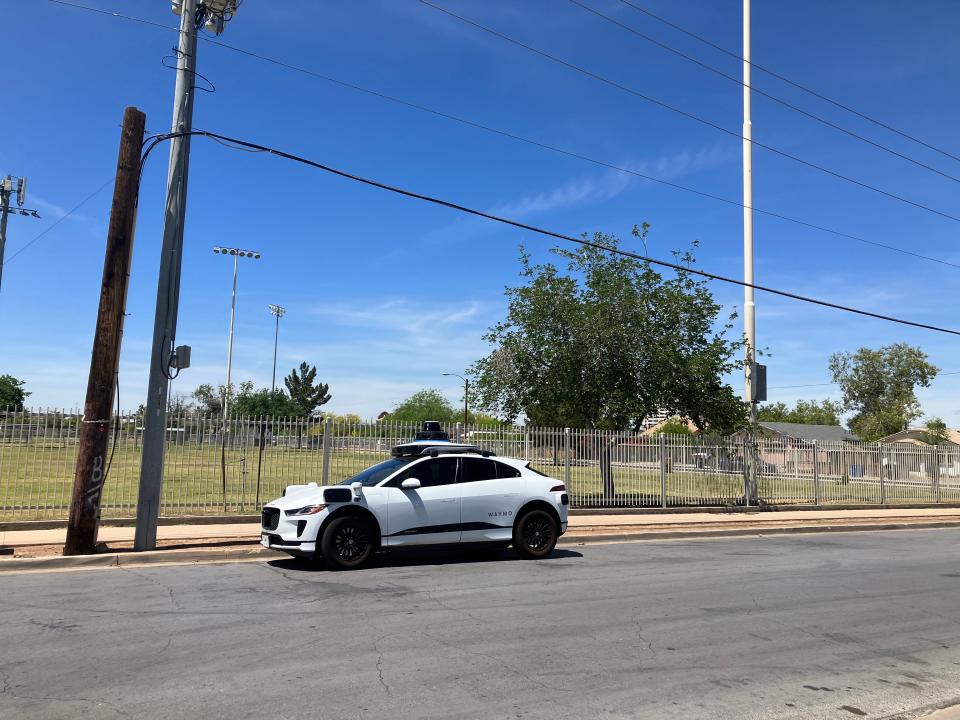 A driverless Waymo vehicle parked in the Garfield neighborhood in Phoenix.